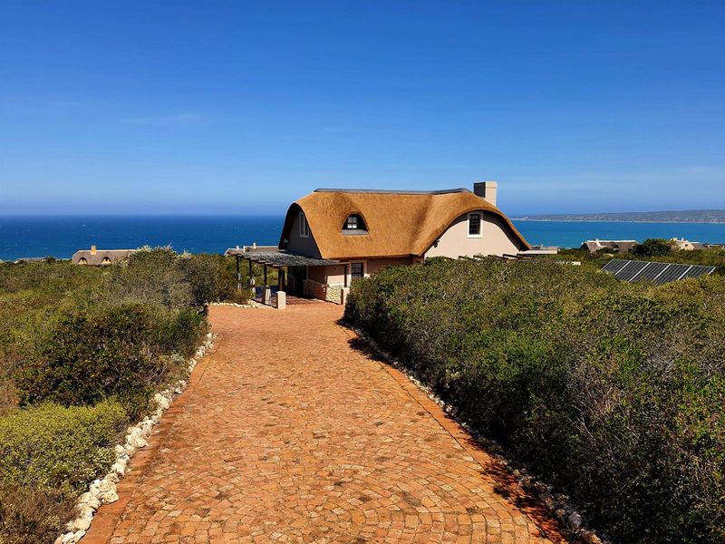 Nature-Embraced Coastal Cottage in Eco Estate - Photo 2