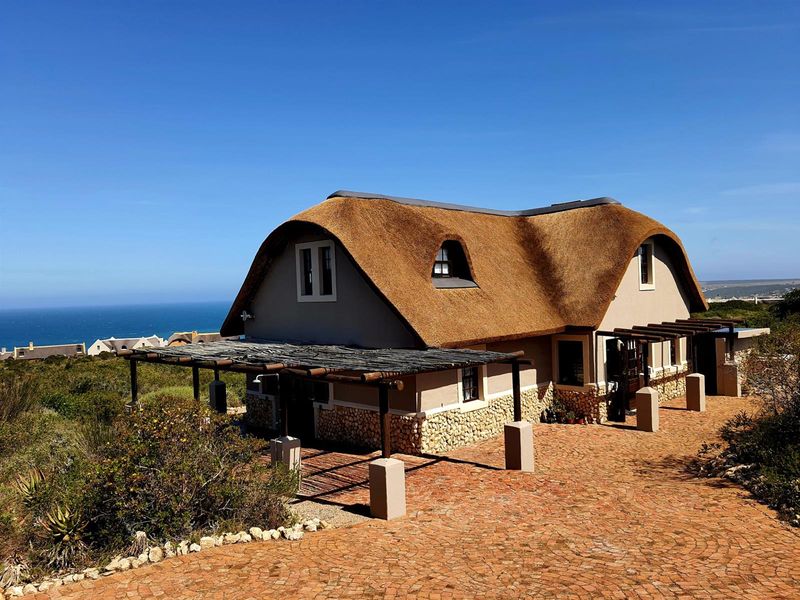 Nature-Embraced Coastal Cottage in Eco Estate - Photo 3