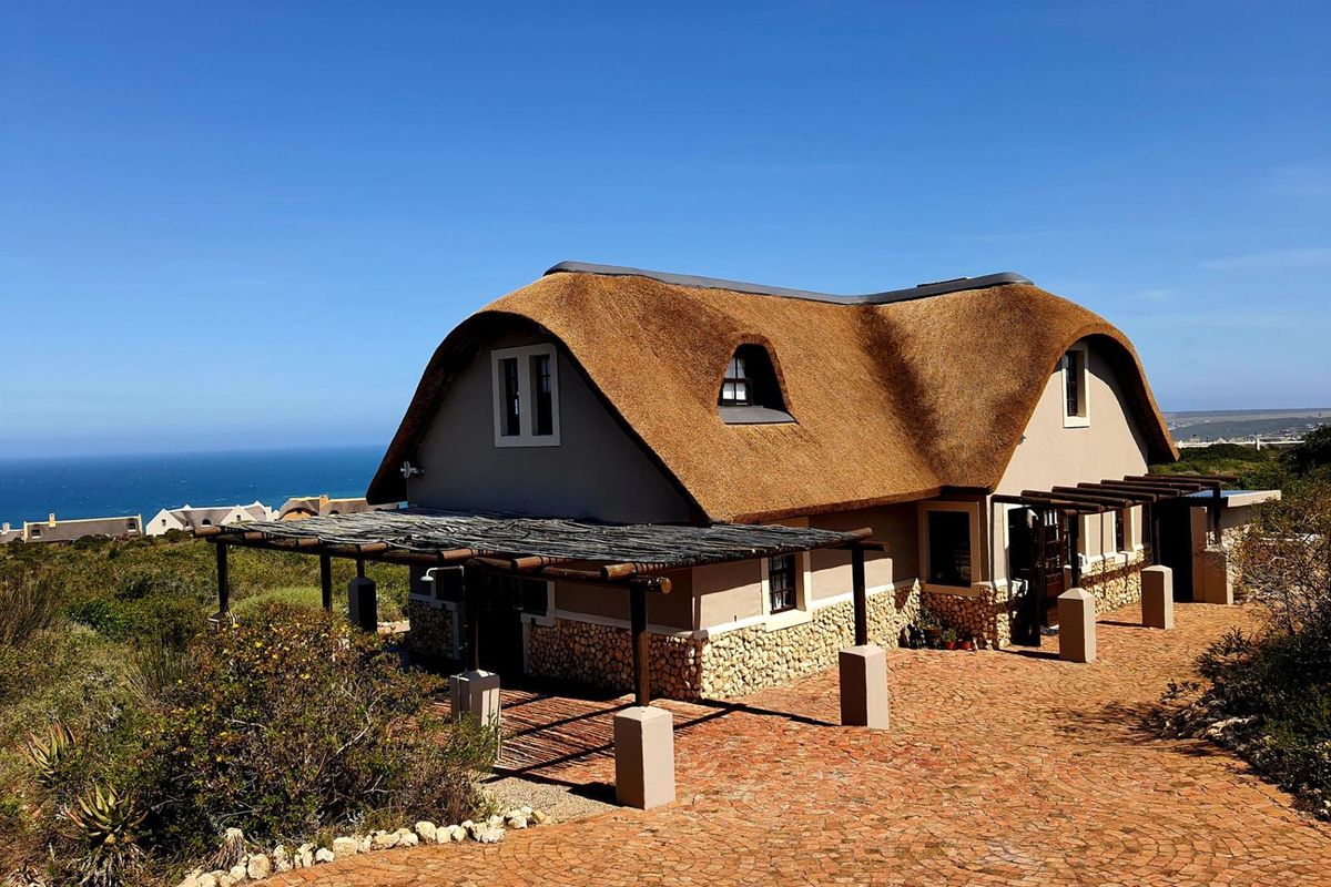 Nature-Embraced Coastal Cottage in Eco Estate - Photo 3