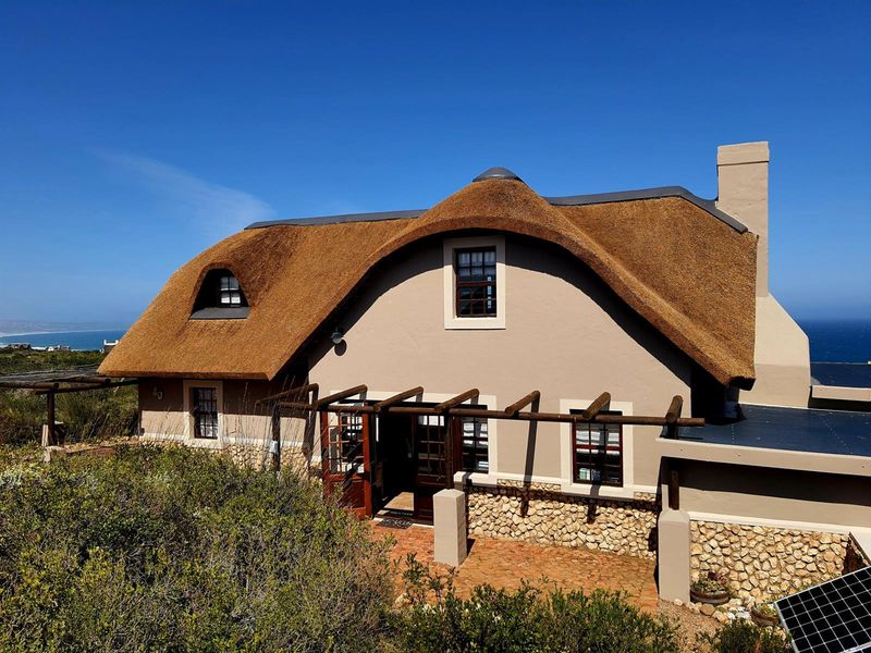 Nature-Embraced Coastal Cottage in Eco Estate - Photo 5