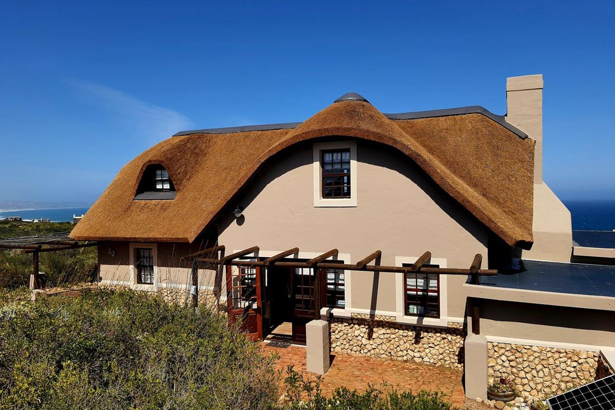 Nature-Embraced Coastal Cottage in Eco Estate - Photo 5