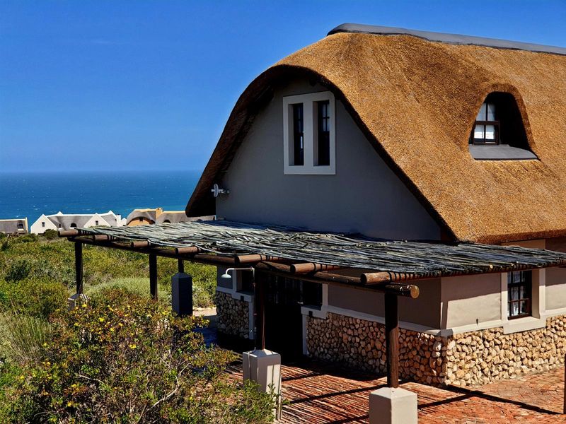 Nature-Embraced Coastal Cottage in Eco Estate - Photo 1