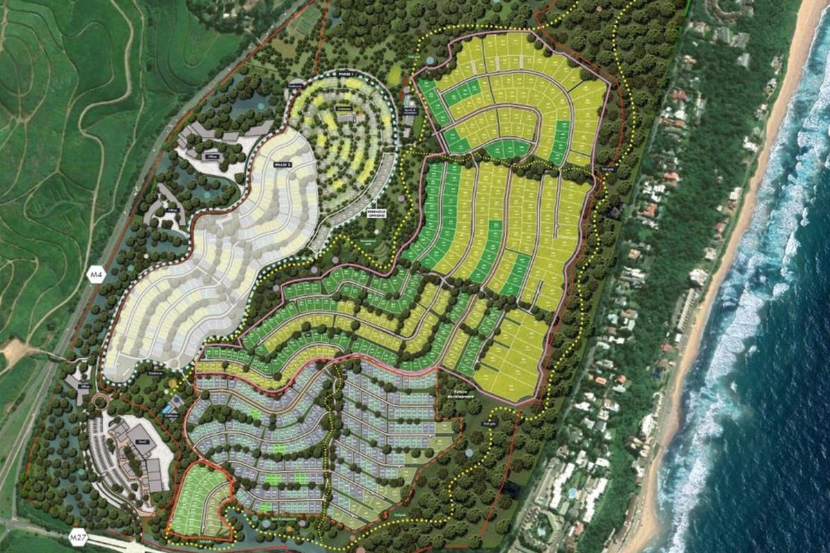An aerial site plan illustrating the layout and development phases of a residential estate located near the coastline.