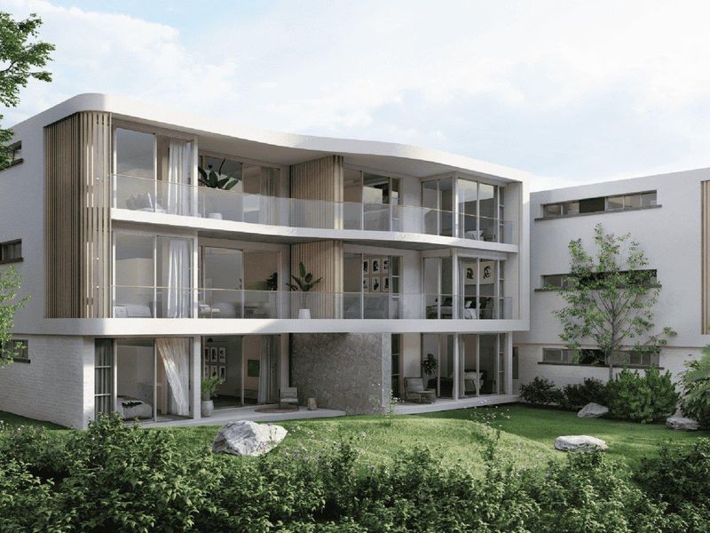 Modern apartment building exterior featuring contemporary architecture, glass balconies, timber accents, and a well-maintained landscaped garden area.