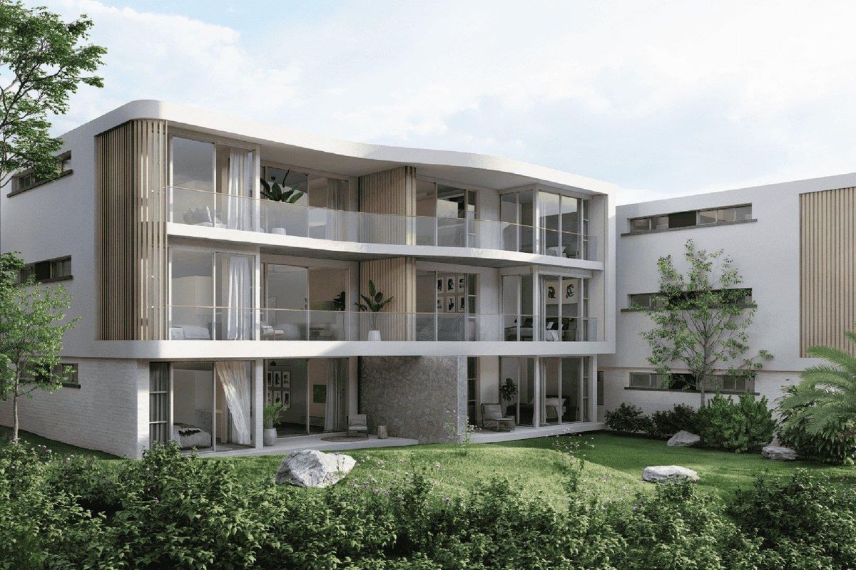 Modern apartment building exterior featuring contemporary architecture, glass balconies, timber accents, and a well-maintained landscaped garden area.
