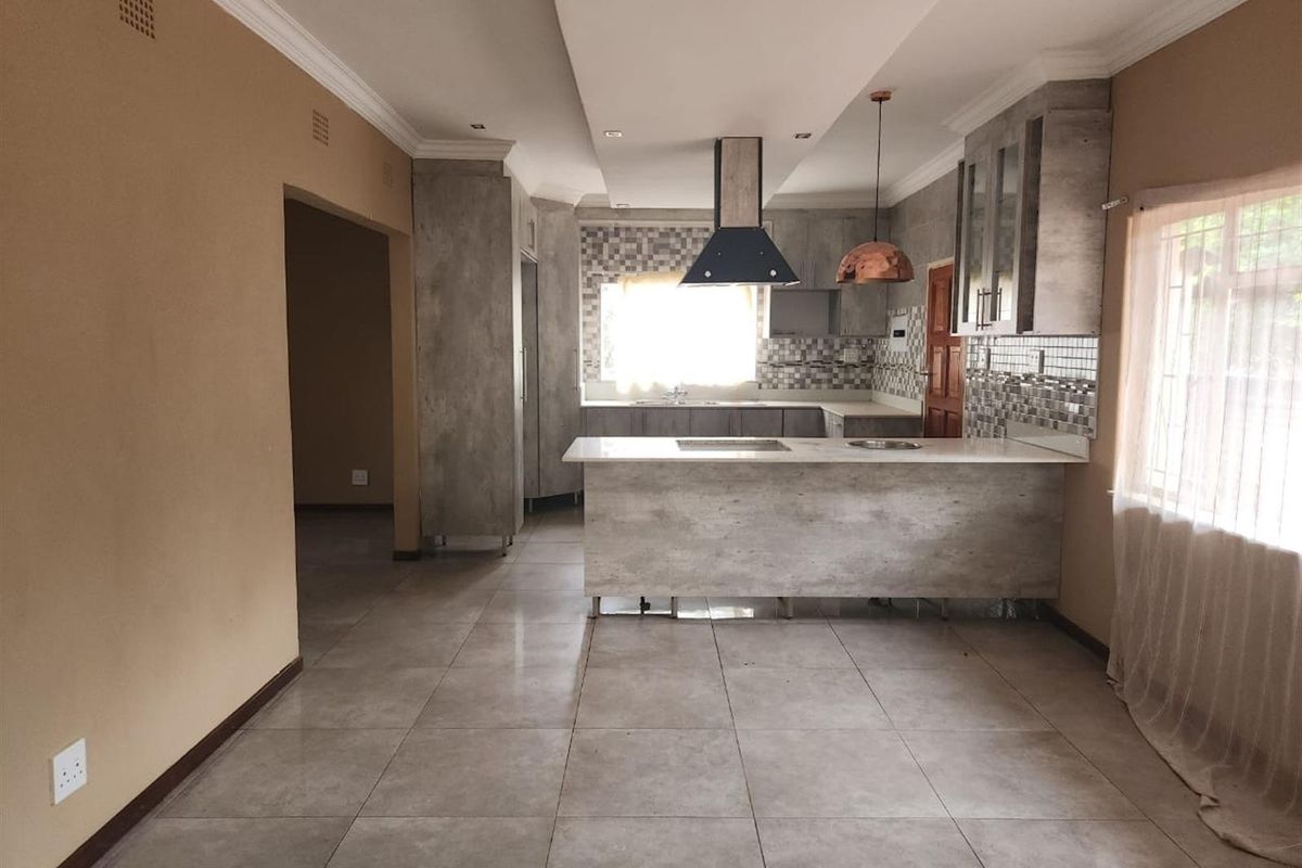 Beautifully Designed Family Home with Dual En-Suites and Modern Flair - Photo 3