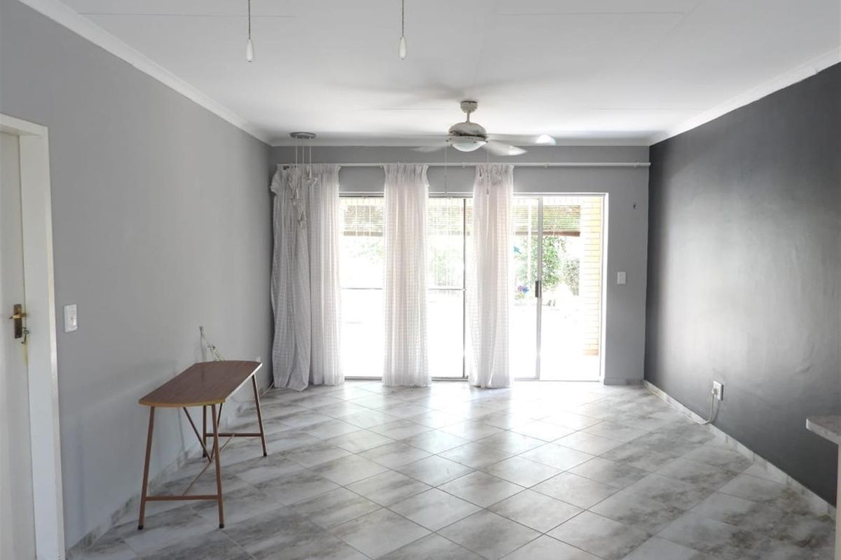 Modern Elegance Meets Effortless Living in an Exclusive Complex - Photo 3