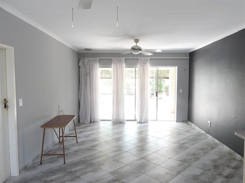 Modern Elegance Meets Effortless Living in an Exclusive Complex - Photo 3