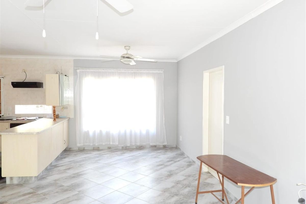 Modern Elegance Meets Effortless Living in an Exclusive Complex - Photo 2