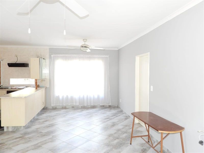 Modern Elegance Meets Effortless Living in an Exclusive Complex - Photo 2