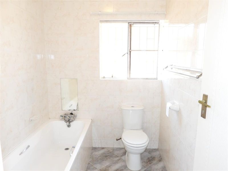 Modern Elegance Meets Effortless Living in an Exclusive Complex - Photo 9