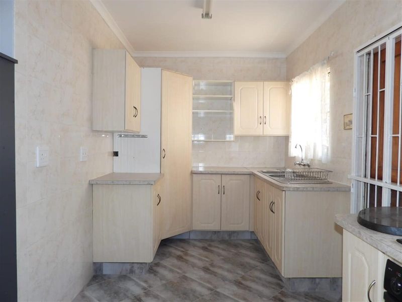 Modern Elegance Meets Effortless Living in an Exclusive Complex - Photo 5