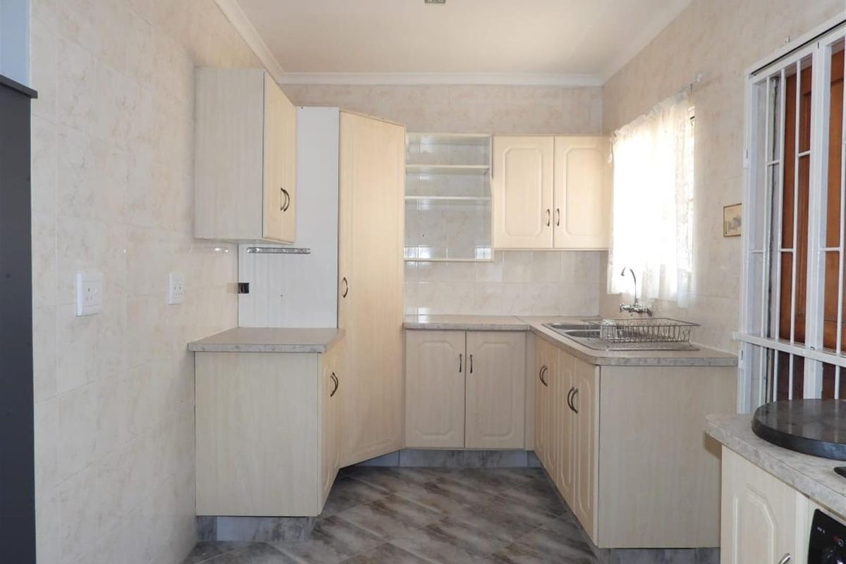 Modern Elegance Meets Effortless Living in an Exclusive Complex - Photo 5