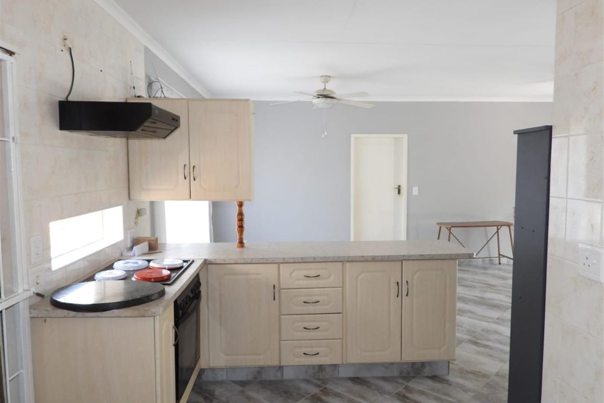 Modern Elegance Meets Effortless Living in an Exclusive Complex - Photo 4