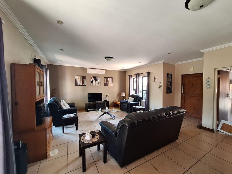 Ready to move into cozy townhouse in Secure Estate - Photo 2