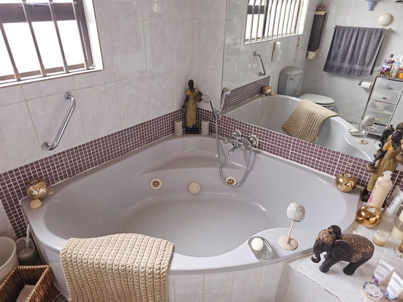 Sophisticated 4-Bedroom Double-Storey Home | Elegant Design Meets Effortless Comfort - Photo 1