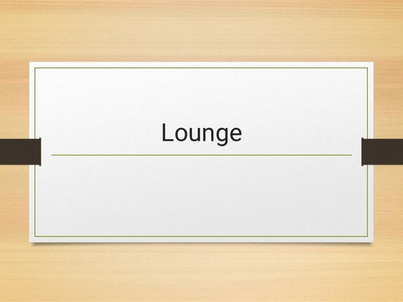 This image is a placeholder slide indicating a lounge area, providing no visual information about the property's actual interior or condition.