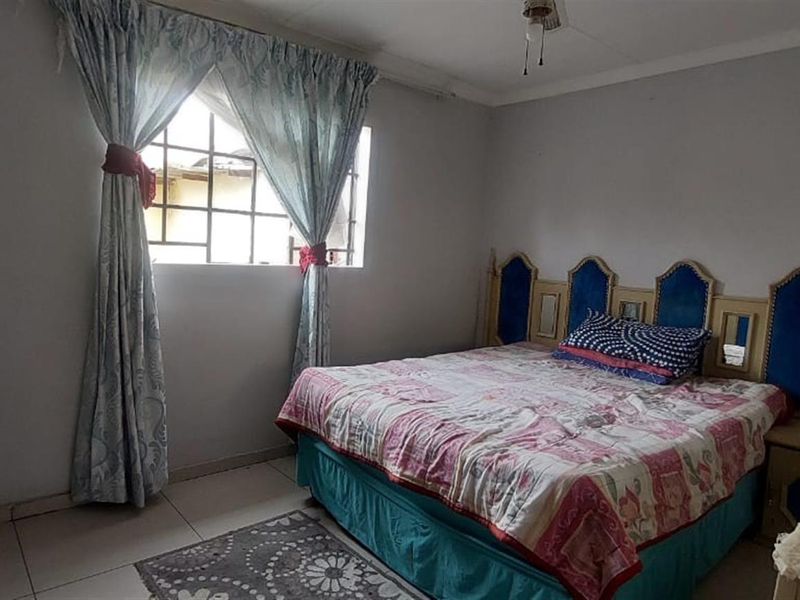 Spacious 4‐Bedroom Family Home with Open‐Plan Living - Photo 7