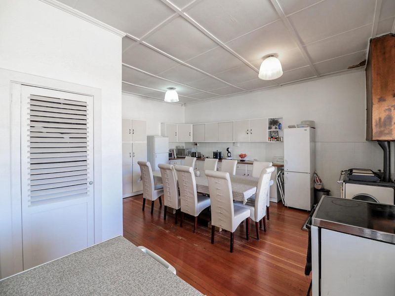 Charming 5-Bedroom Home with Timeless Wooden Floors & Exceptional Living Space - Photo 6