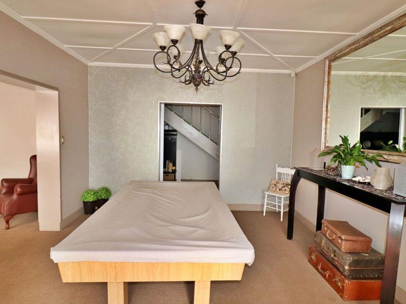 Charming 5-Bedroom Home with Timeless Wooden Floors & Exceptional Living Space - Photo 3