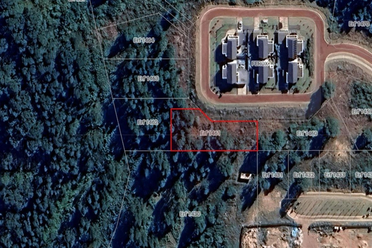 Aerial view of vacant residential land plot Erf 1461, showing boundary lines and surrounding terrain in a developed estate setting.