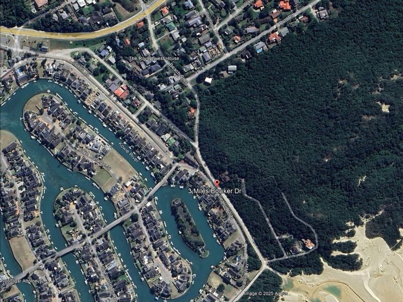 An aerial view of the residential area and surrounding landscape, highlighting the property location and proximity to the canal and coastal forest.