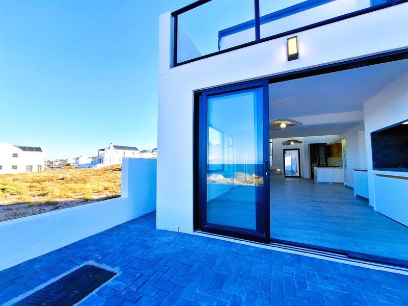 Brand New show-stopping Beachfront Home - a Coastal Gem. - Photo 3