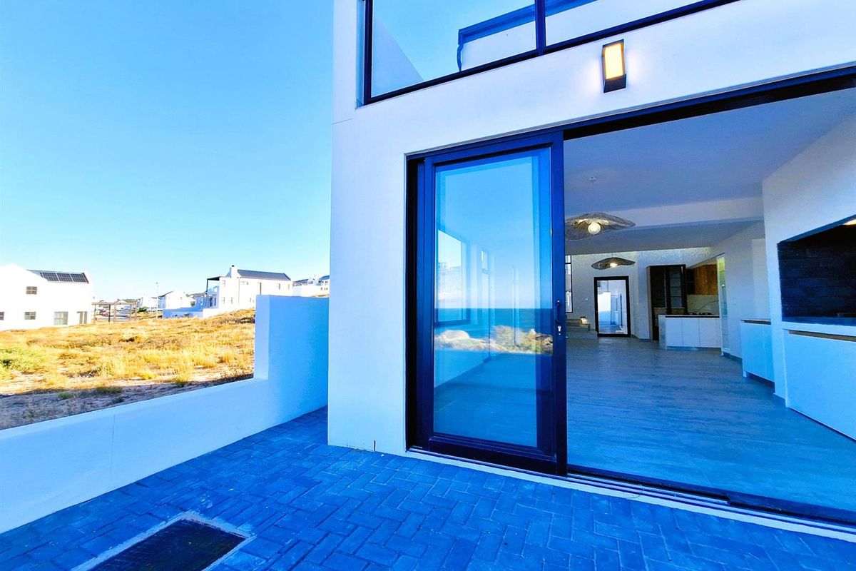 Brand New show-stopping Beachfront Home - a Coastal Gem. - Photo 3