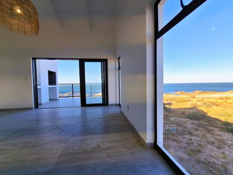 Brand New show-stopping Beachfront Home - a Coastal Gem. - Photo 4