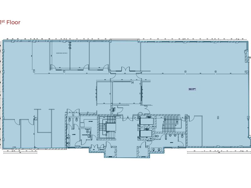 A detailed architectural floor plan of the first floor, illustrating the layout of office spaces, circulation areas, staircases, elevators, and utility rooms.
