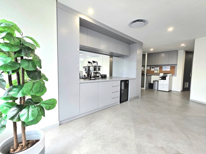 Elevate your workspace with this modern 6-person office - Photo 9