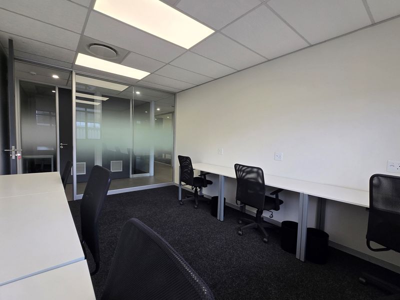 Elevate your workspace with this modern 6-person office - Photo 5