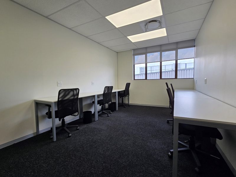 Elevate your workspace with this modern 6-person office - Photo 2