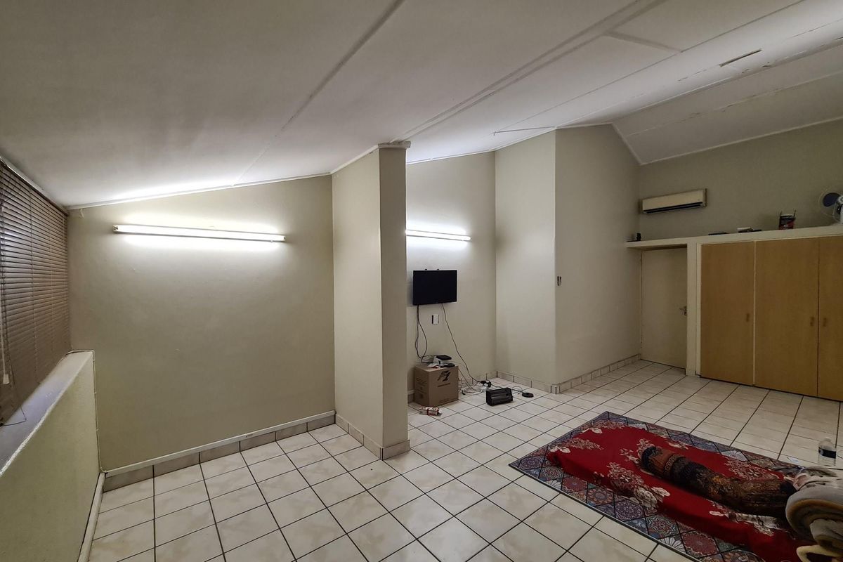 Versatile Commercial Office Space and Apartment in Cedrella Building - Photo 3