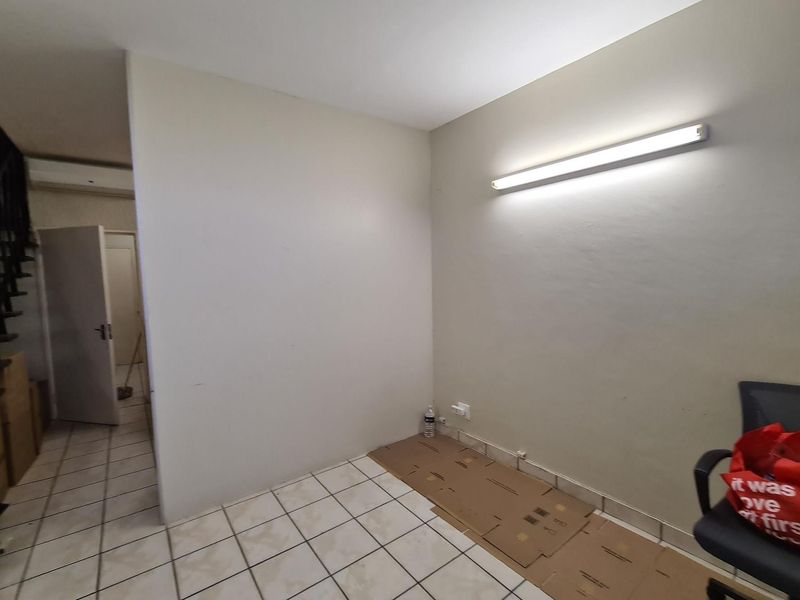 Versatile Commercial Office Space and Apartment in Cedrella Building - Photo 9