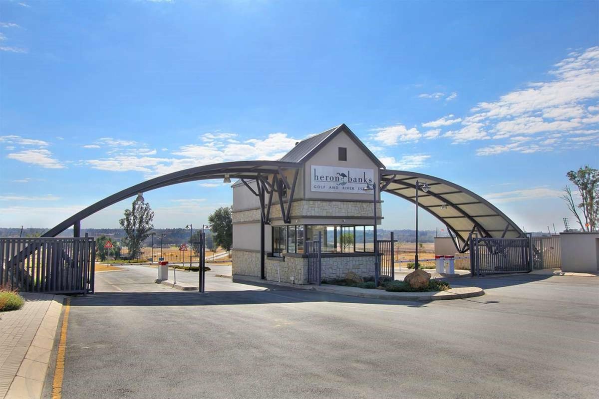 Unveil Your Vision: Prime Vacant Land for Sale at Heron Banks! Craft Your Dream Oasis - Photo 2