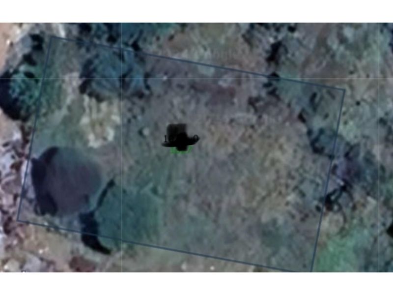 An aerial satellite view of the vacant residential land plot.