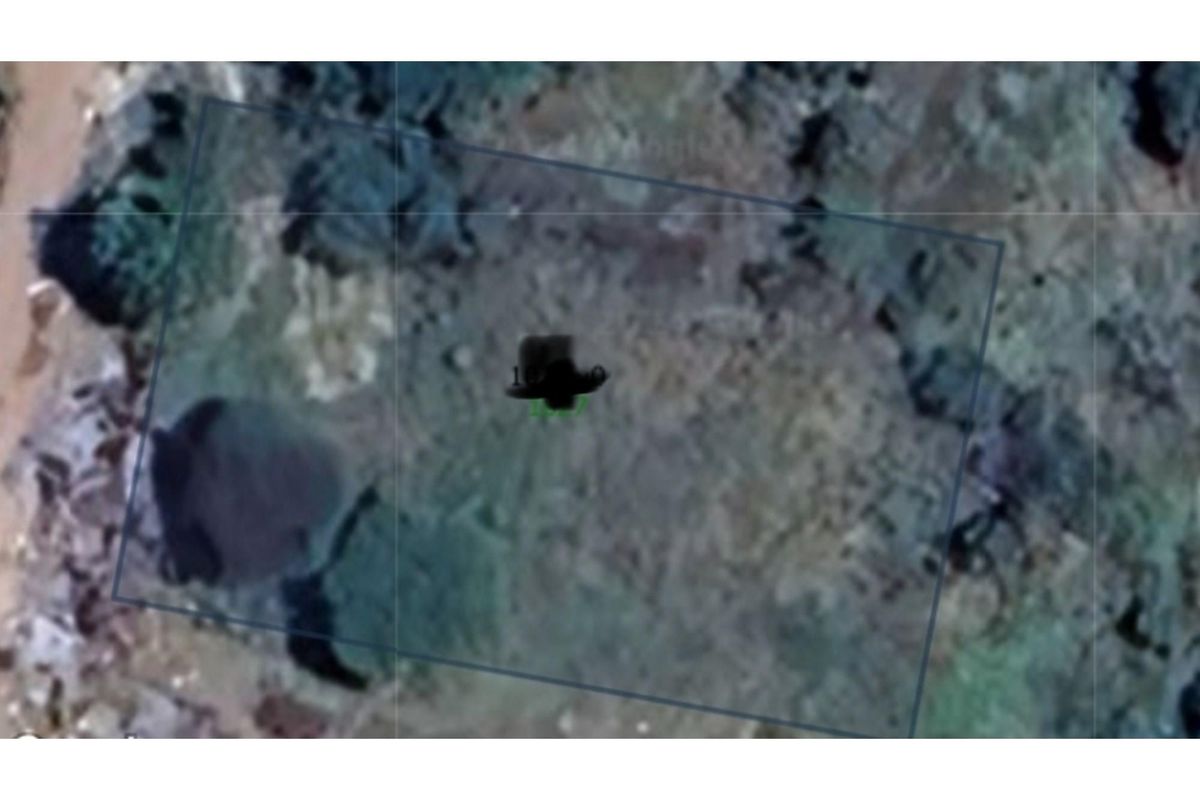 An aerial satellite view of the vacant residential land plot.