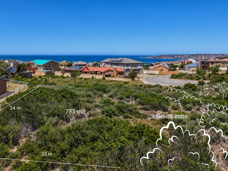Aerial view of a 733 square meter vacant residential plot featuring coastal views and proximity to established neighborhood infrastructure.