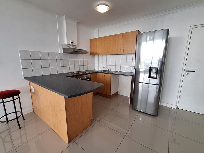 Step into light-filled, low-maintenance living with this modern and well-kept 1-bedroom apartment - Photo 6