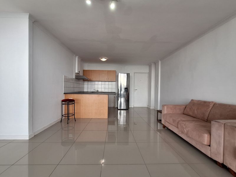 Step into light-filled, low-maintenance living with this modern and well-kept 1-bedroom apartment - Photo 4