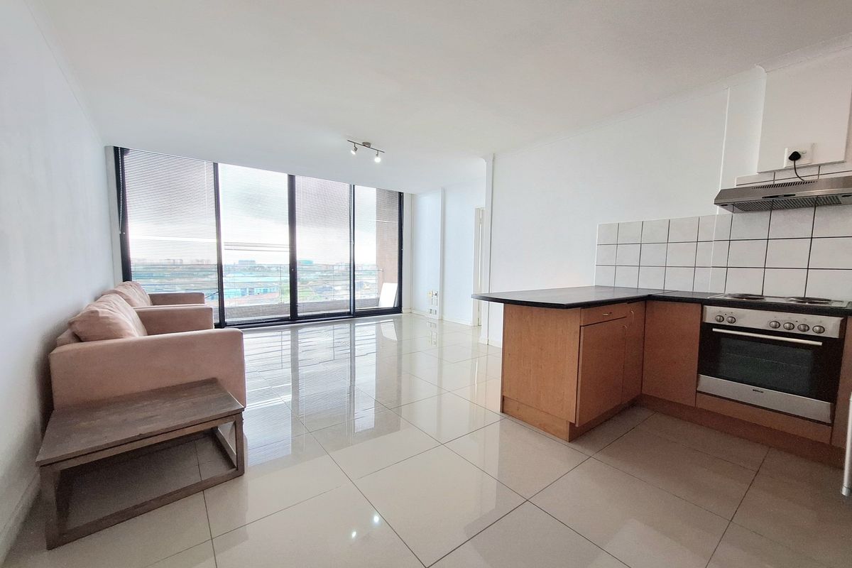 Step into light-filled, low-maintenance living with this modern and well-kept 1-bedroom apartment - Photo 2