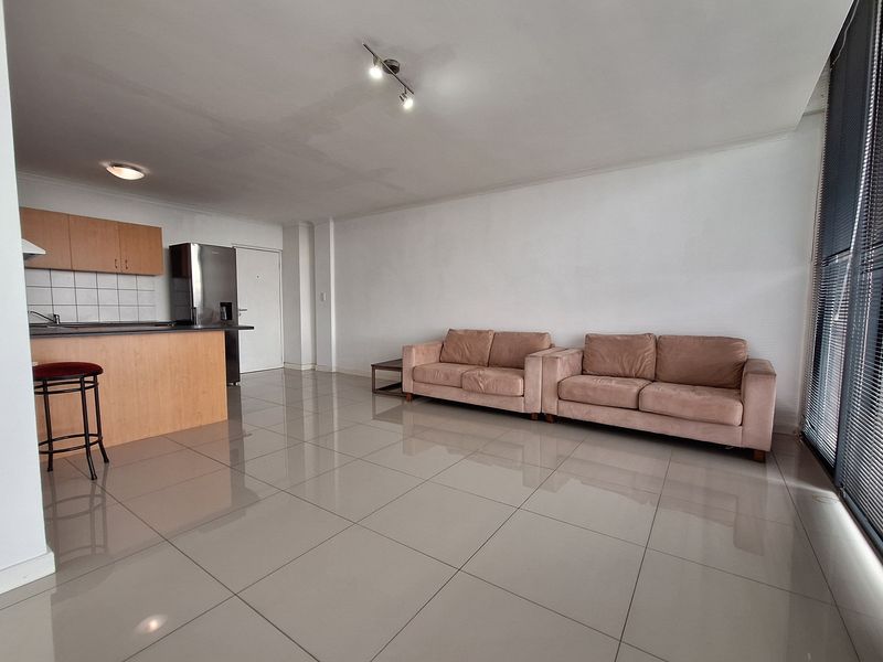 Step into light-filled, low-maintenance living with this modern and well-kept 1-bedroom apartment - Photo 3