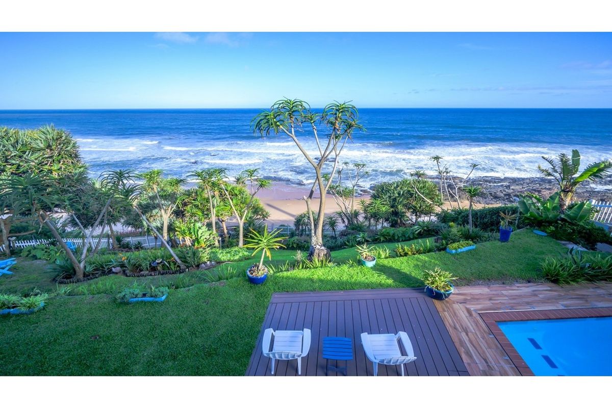 Accepting Reasonable Offers -Stunning Beachfront Home with Three Income Generating Apartments - Photo 3