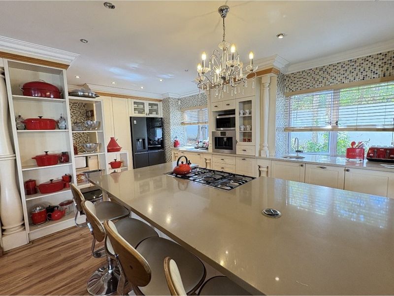 Exquisite 5-Bedroom Family Home- A Statement of Grandeur and Warmth - Photo 8