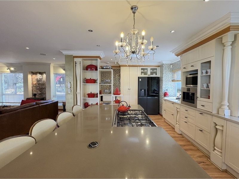 Exquisite 5-Bedroom Family Home- A Statement of Grandeur and Warmth - Photo 9