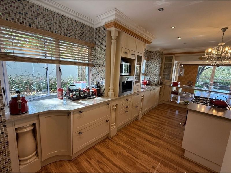 Exquisite 5-Bedroom Family Home- A Statement of Grandeur and Warmth - Photo 7