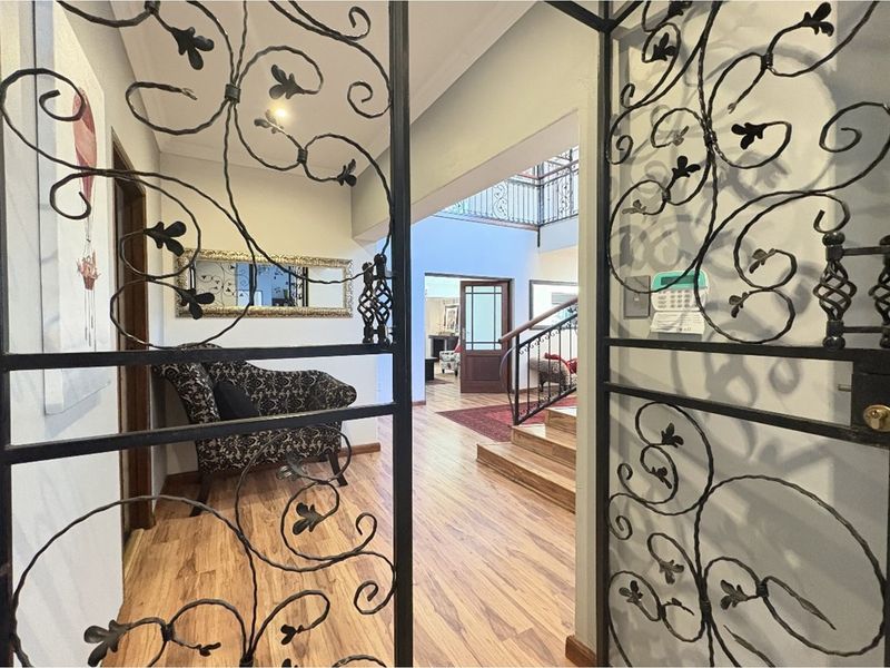 Exquisite 5-Bedroom Family Home- A Statement of Grandeur and Warmth - Photo 5