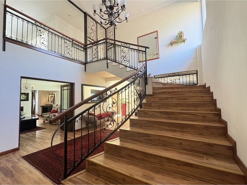 Exquisite 5-Bedroom Family Home- A Statement of Grandeur and Warmth - Photo 6