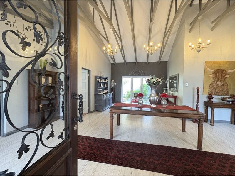 Exquisite 5-Bedroom Family Home- A Statement of Grandeur and Warmth - Photo 3